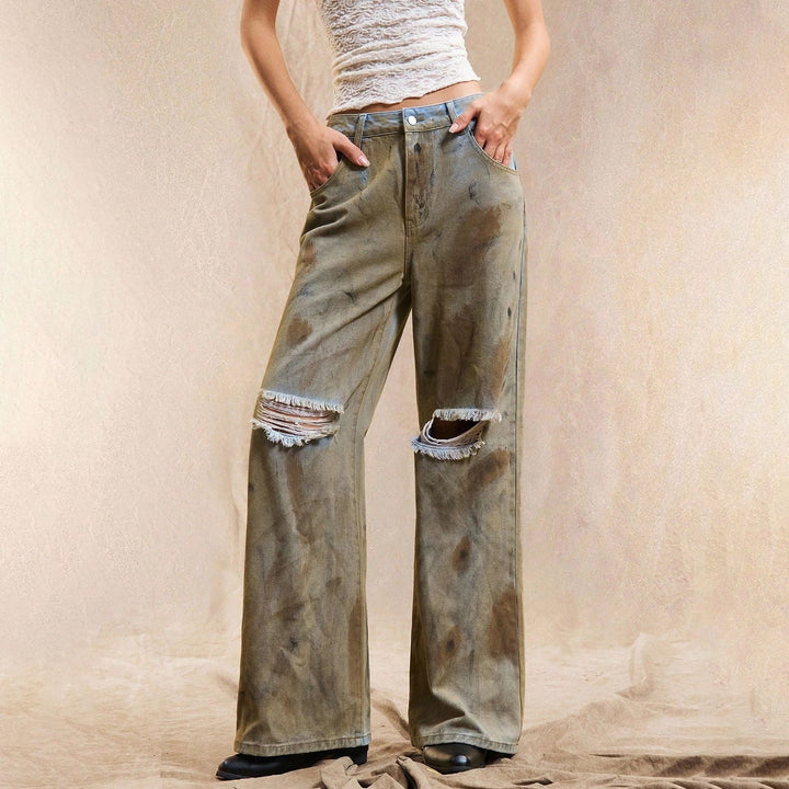 Kvindernes bredskårne jeans med slidte detaljer Stilla