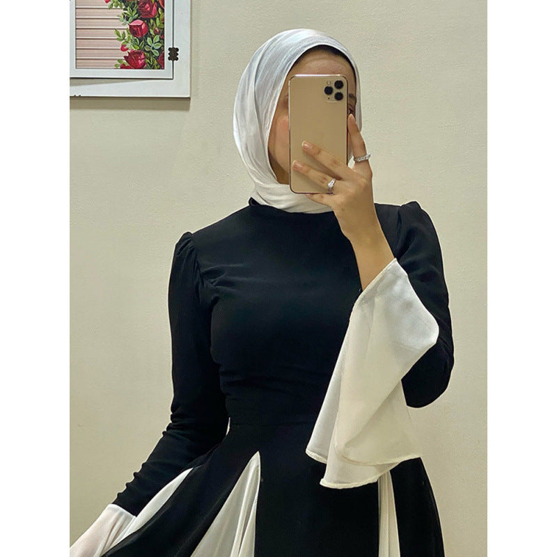 Dame elegant maxikjole med asymmetrisk skørt og voluminøse ærmer Stilla
