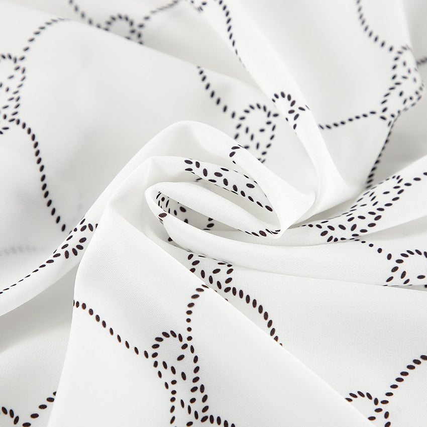 Dame høj kvalitets satin-pyjamas med knaplukning og elegant mønster Stilla