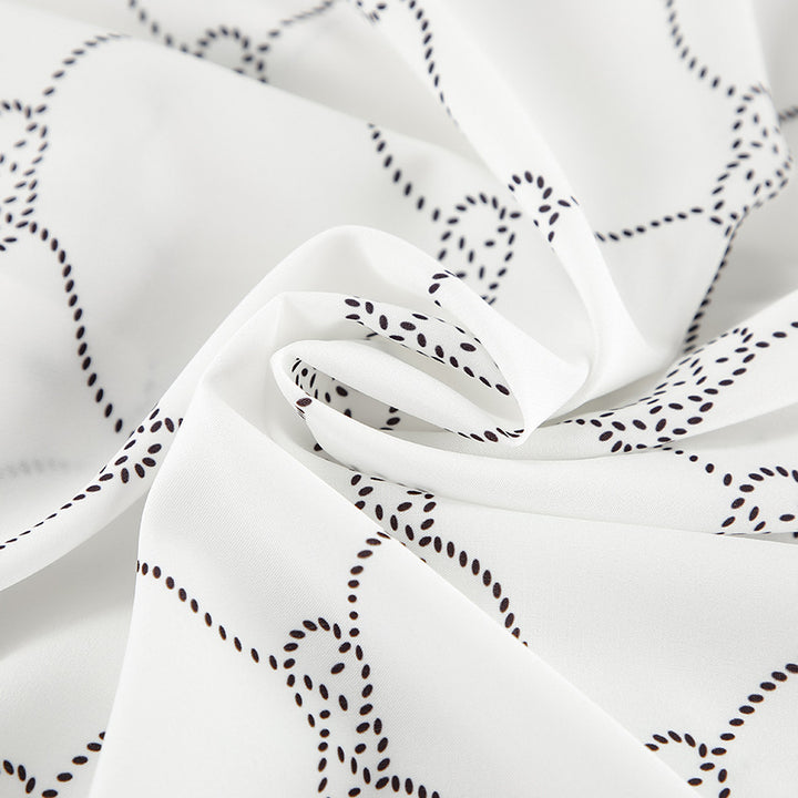 Dame høj kvalitets satin-pyjamas med knaplukning og elegant mønster Stilla
