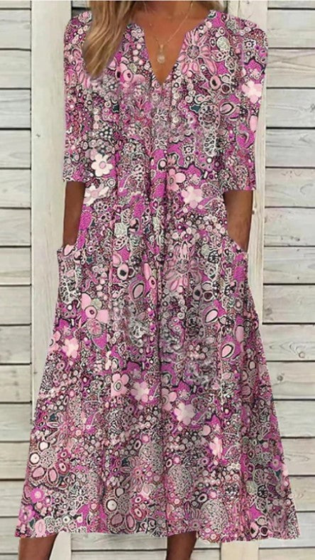 Dame maxikjole med blomster mønstre og praktiske sidelommer Stilla