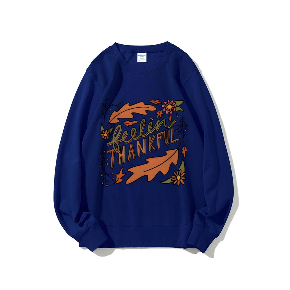 Kvinders sweatshirt med farverigt efterårsdesign og inspirerende tekst Stilla