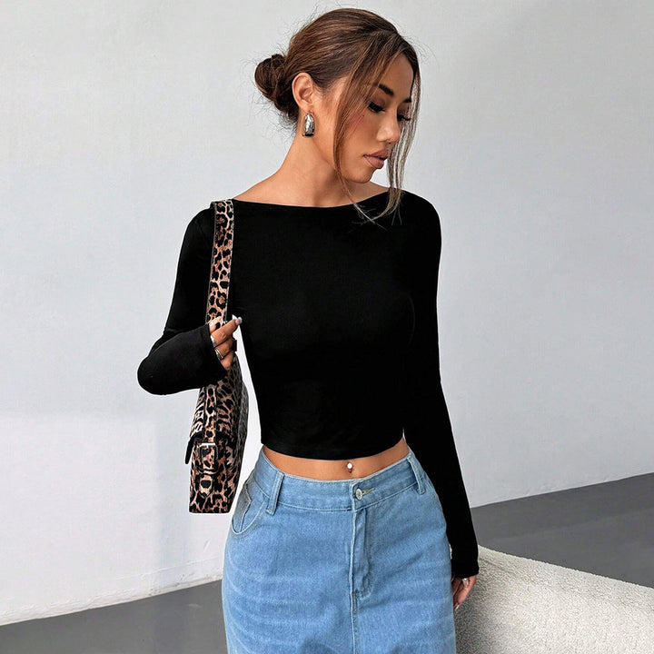 Kvindernes langærmede crop top med elegant rund halsudskæring og figur-fremhævende snit Stilla