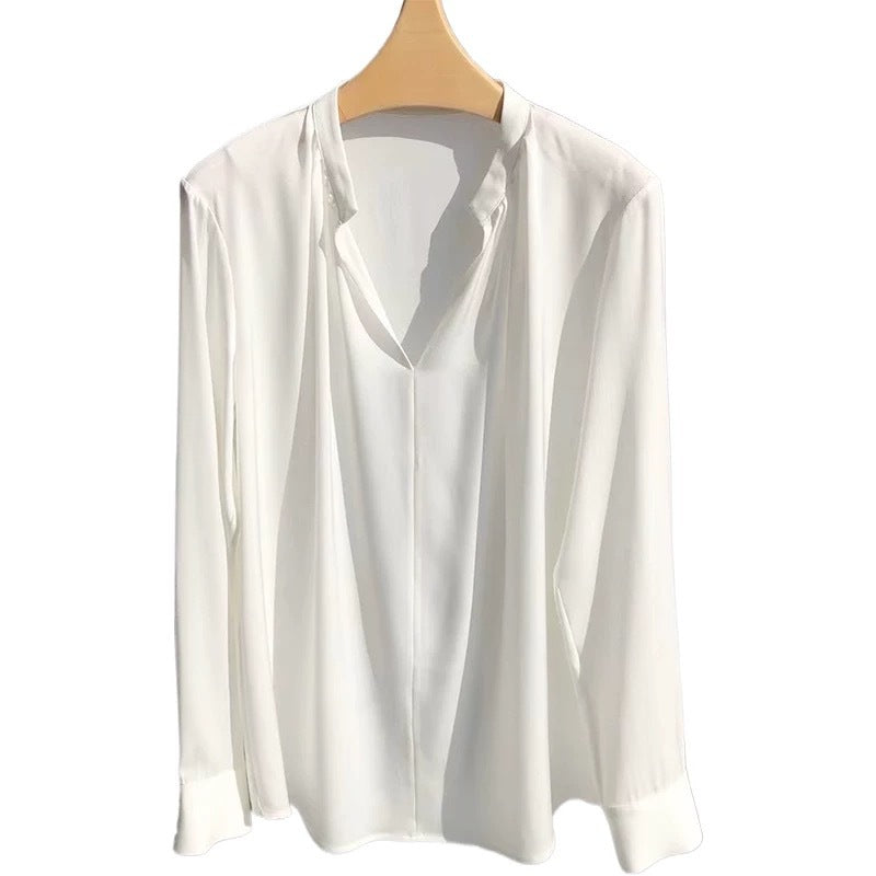 Damebluse med elegant V-udskæring og fint drapering Stilla