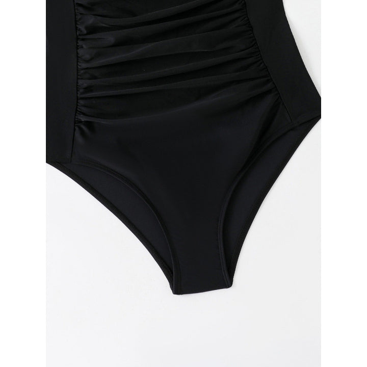 Dame one-piece badedragt med figurformende snit og elegant halterneck Skovae