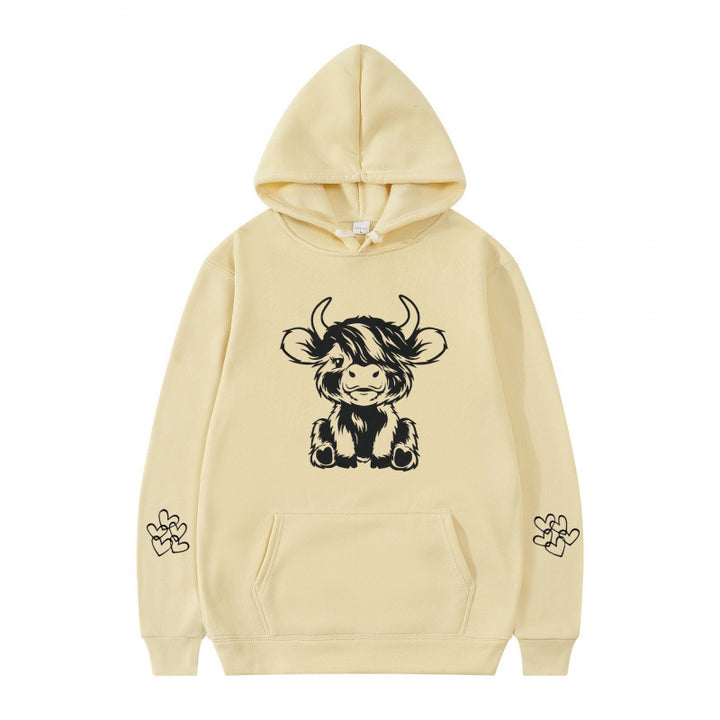 Kvindernes hætte sweatshirt med charmerende kvægmotiv og praktiske kængurulommer Skovae