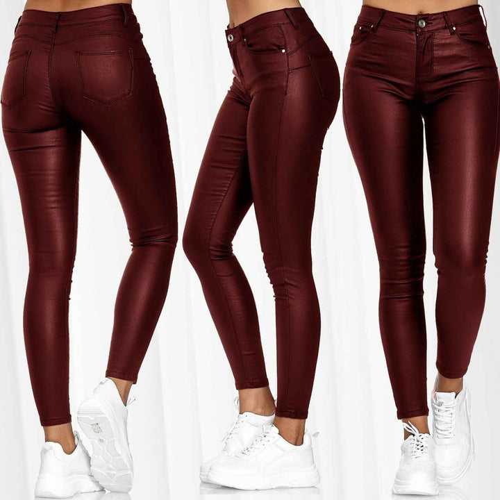 Dame lak leggings i skinny-fit stil med høj talje og praktiske lommer Stilla