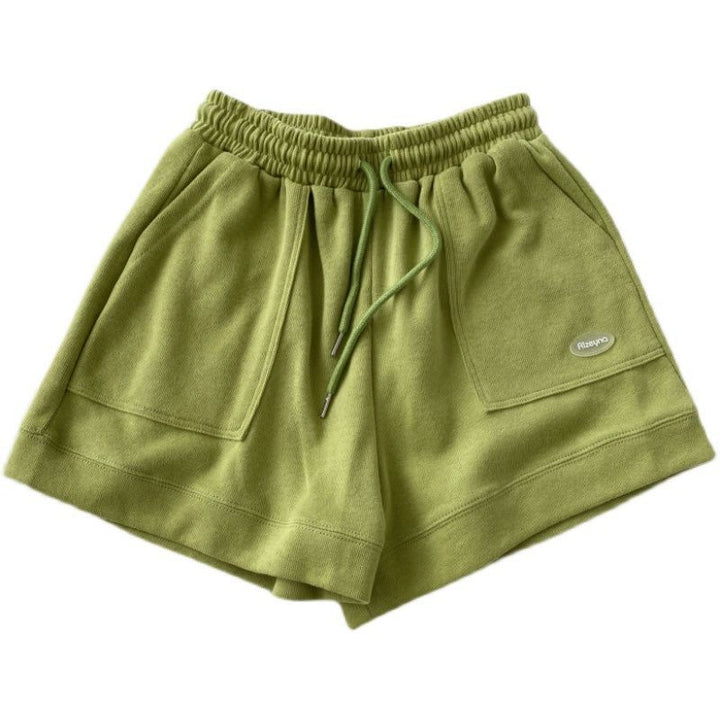 Kvindernes afslappede joggingshorts med elastisk talje og praktiske sidelommer