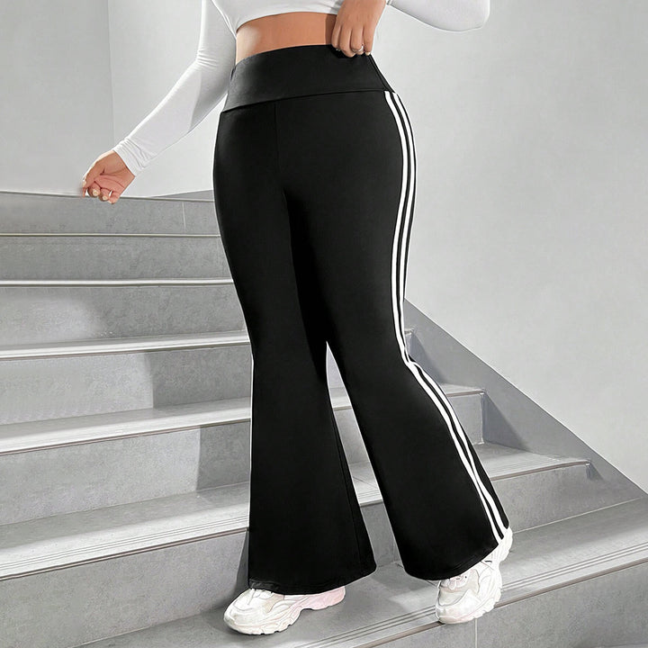 Damer Sporty Flared Leggings med elastisk talje og sidelange striber Stilla
