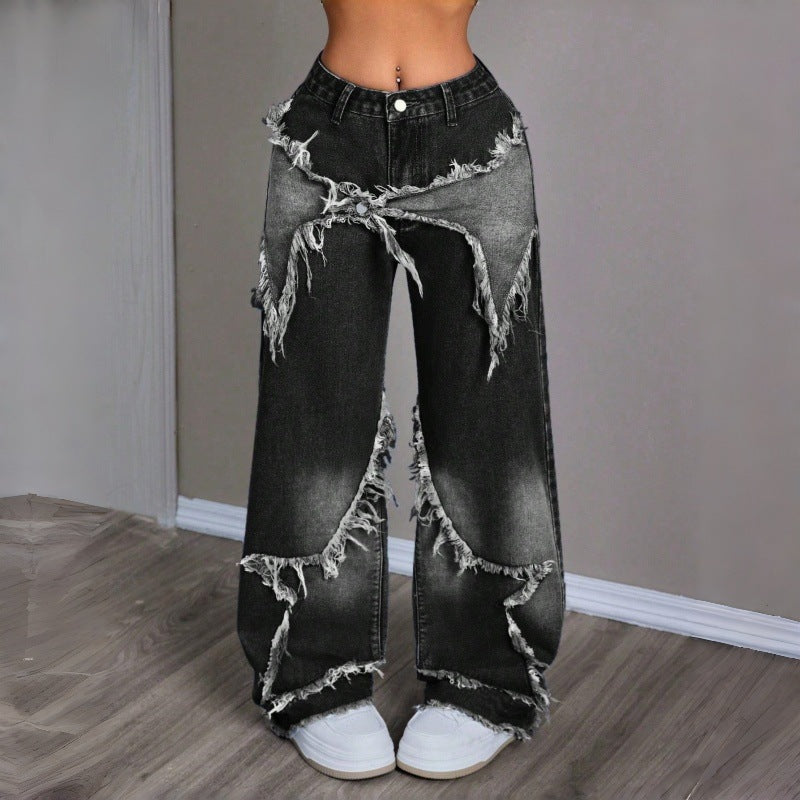 Damebredde jeans i moderne destroyed-look med frynset detaljer Skovae