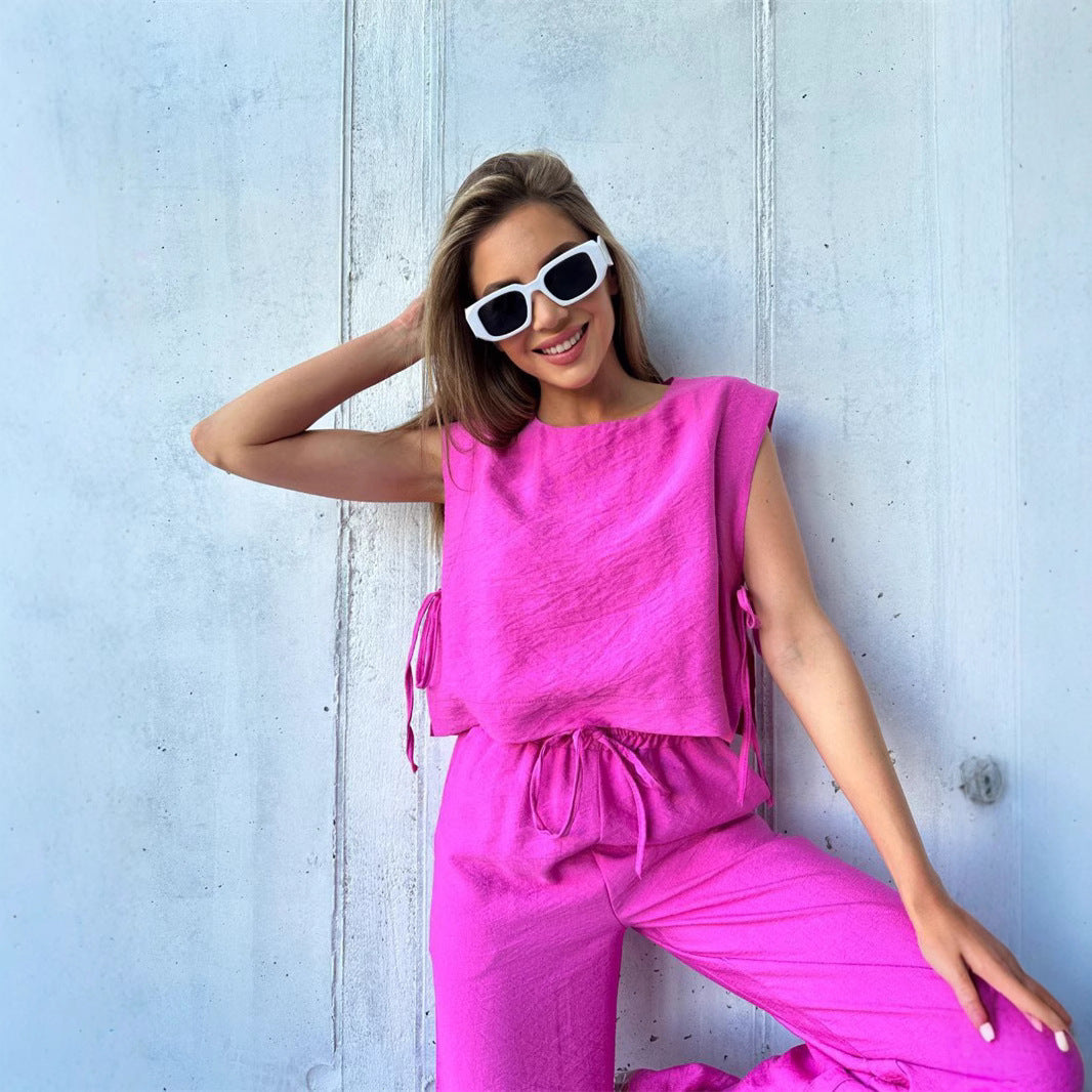 Kvinders bredbenede jumpsuit med lagdelt top og snøre Skovae