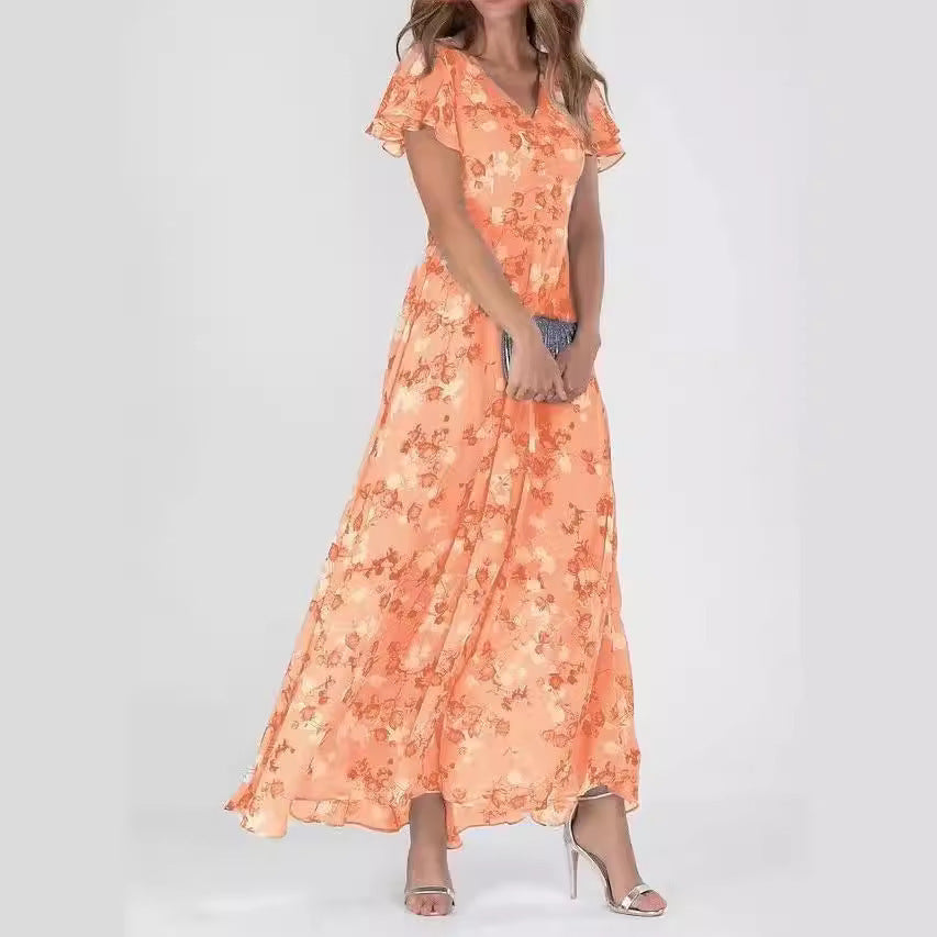 Dame maxikjole med flydende chiffon, sarte flæse detaljer og blomstrende mønster Stilla