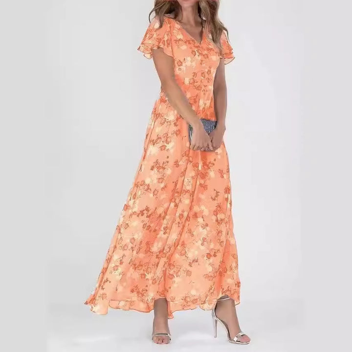Dame maxikjole med flydende chiffon, sarte flæse detaljer og blomstrende mønster Stilla