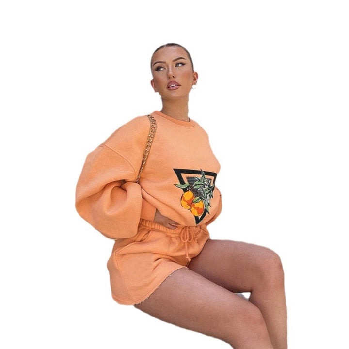 Dames sporty sweatshirt og shorts sæt med urban frugt motiv og casual snit