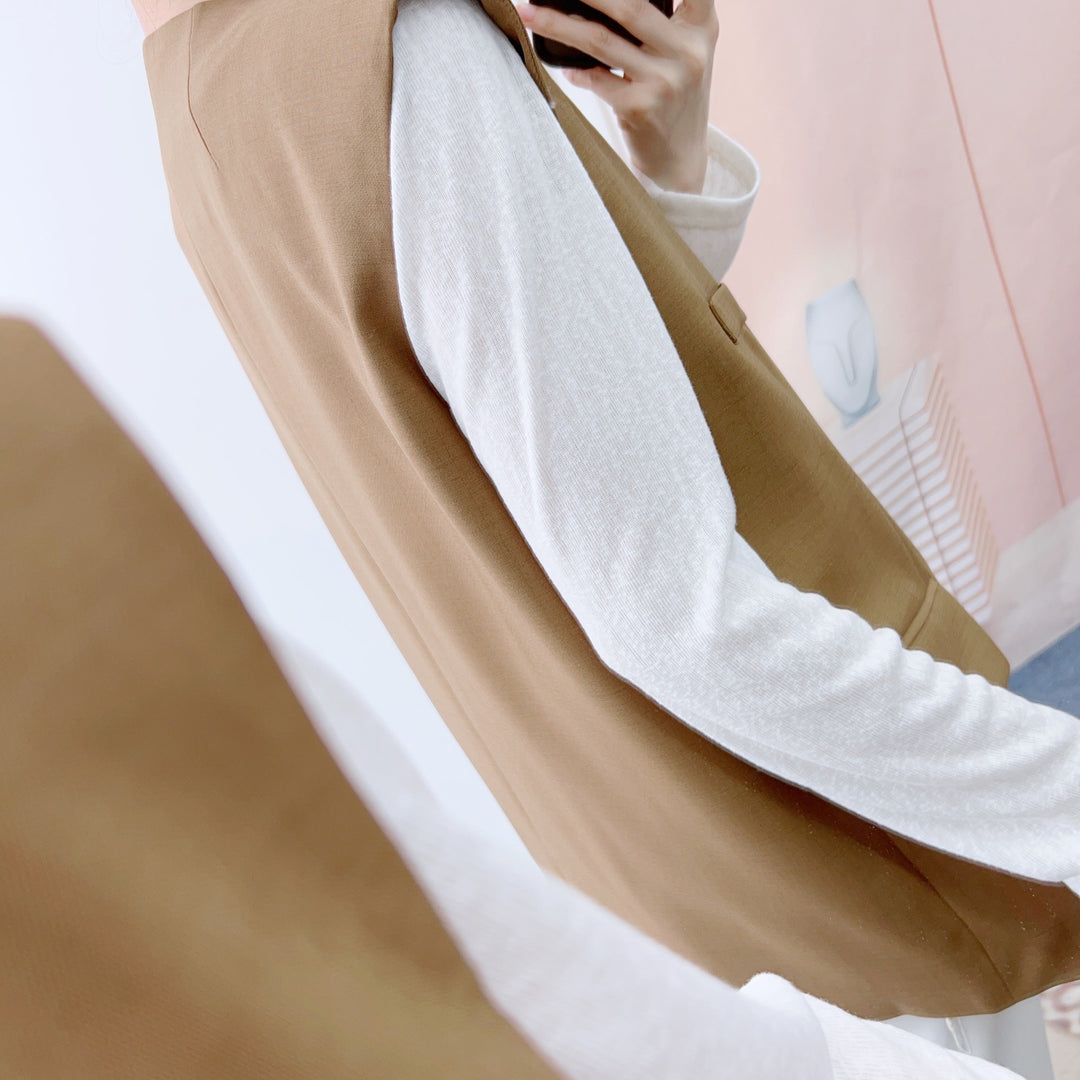 Dame elegant vest med minimalistisk design og praktiske lommer Stilla