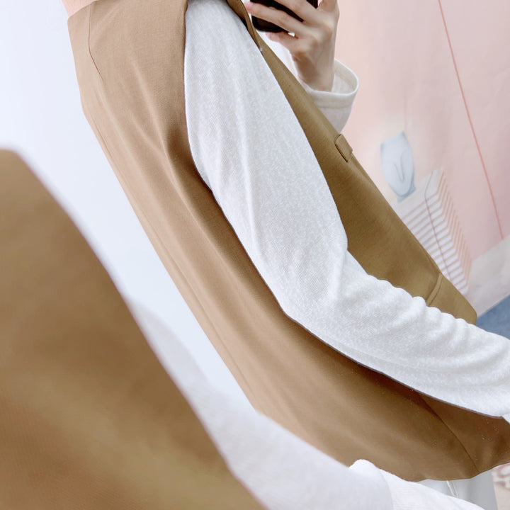 Dame elegant vest med minimalistisk design og praktiske lommer Stilla