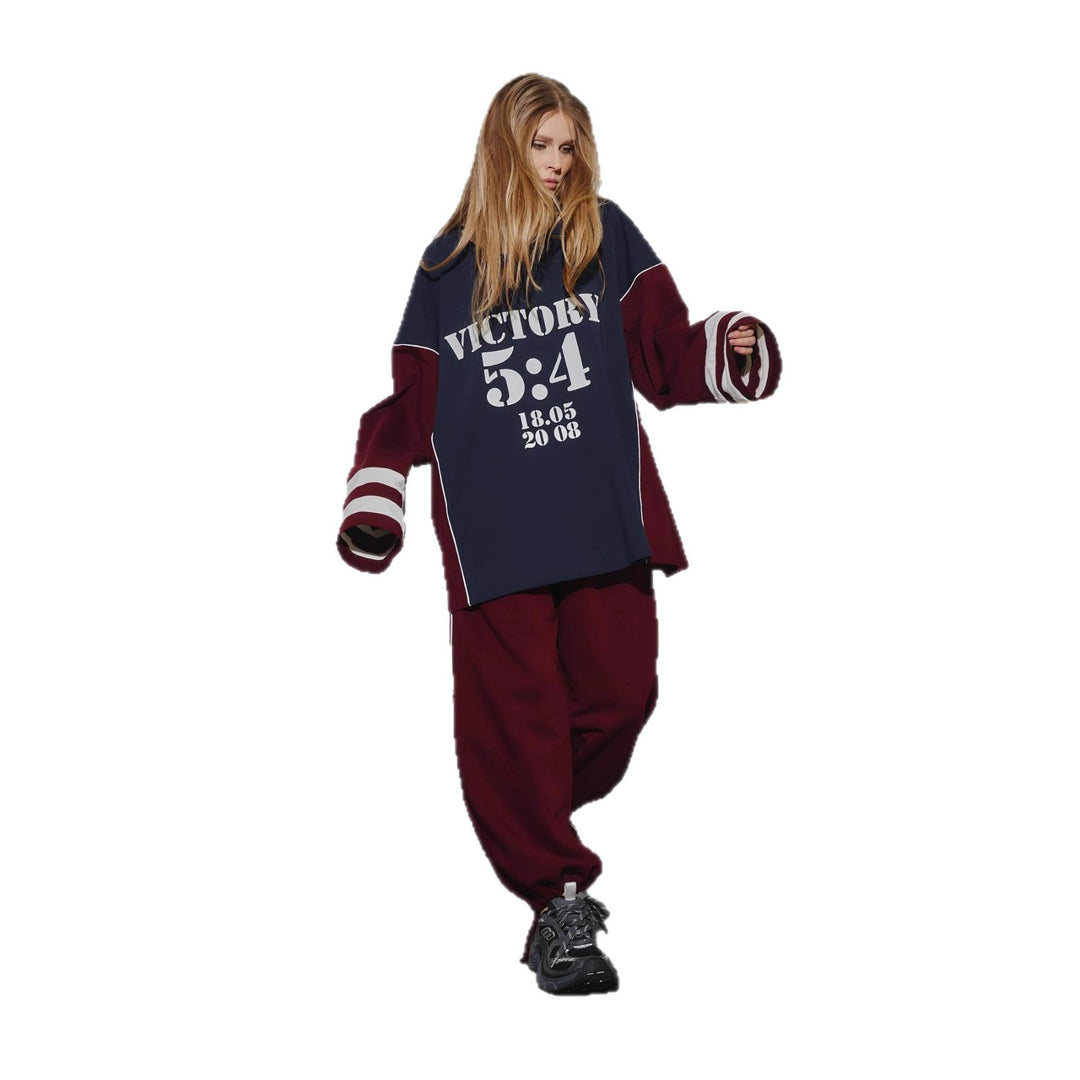 Kvinders oversized tracksuit med grafisk print og brede bukser Stilla