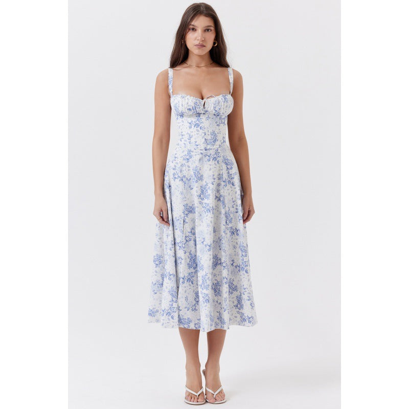 Dame maxikjole med floral design og elegant slids Skovae