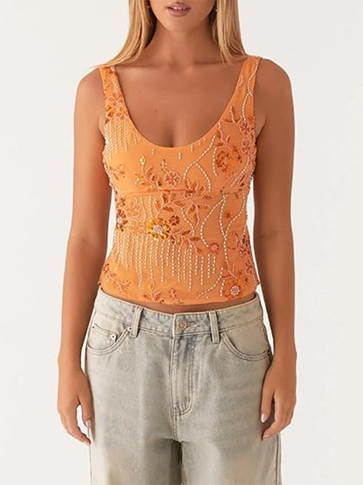 Dame couture top med floral rhinestone design og tætsiddende snit