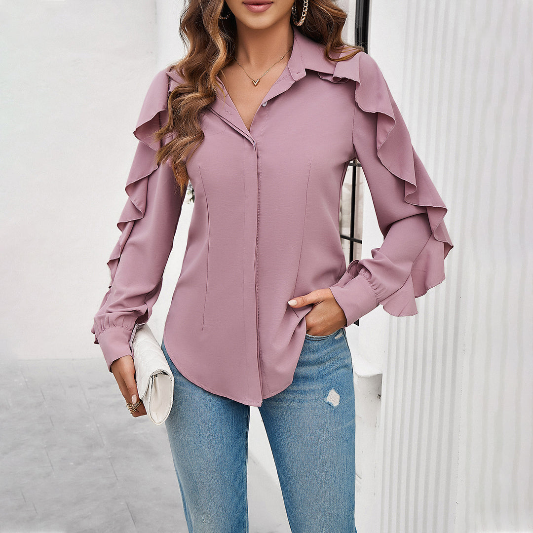 Damebluse med flæse detaljer og elegante knapbesætninger Stilla