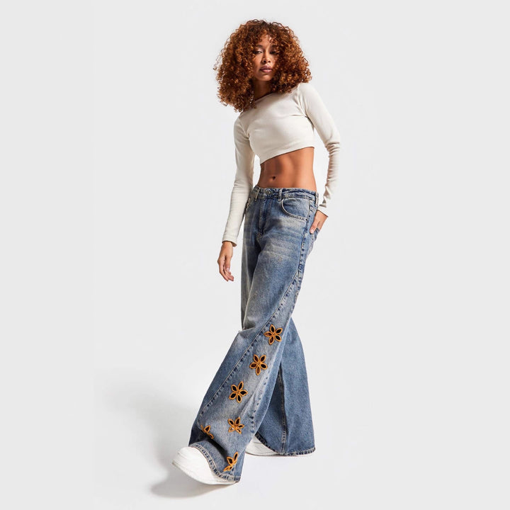 Dame brede jeans med blomstret broderi Skovae