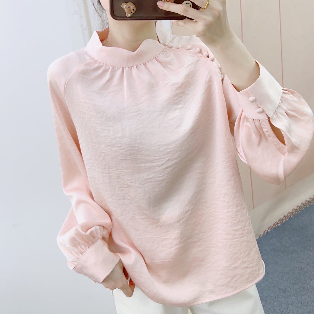 Damebluse med dekorative puffærmer og elegant ståkrave Stilla
