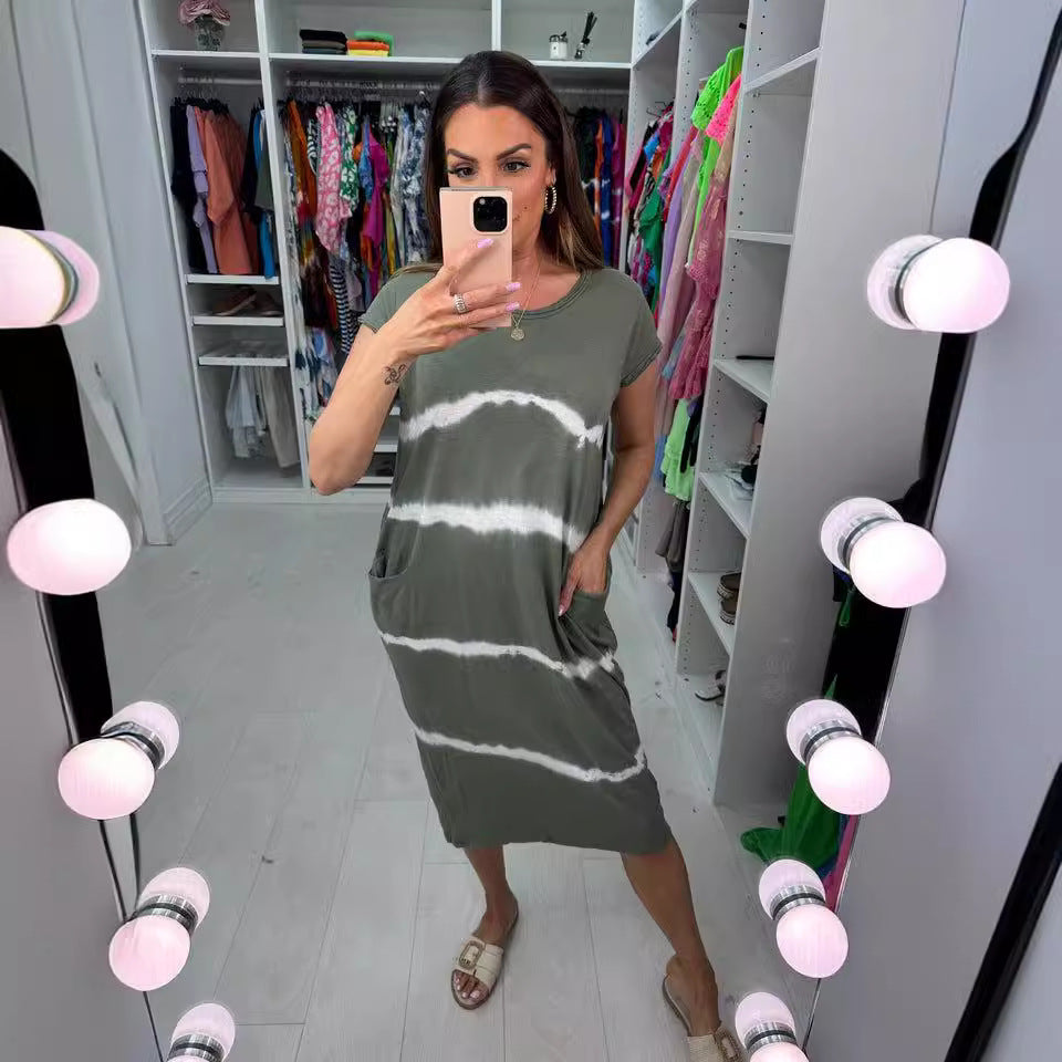 Dame fritidkjole med praktiske lommer og moderne batiklook Stilla