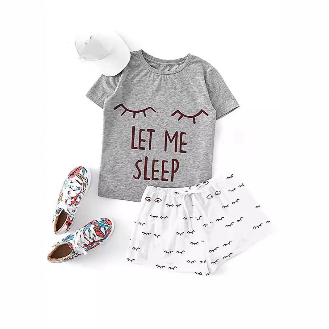 Dame pyjamaset med sjov print og komfortable shorts Stilla