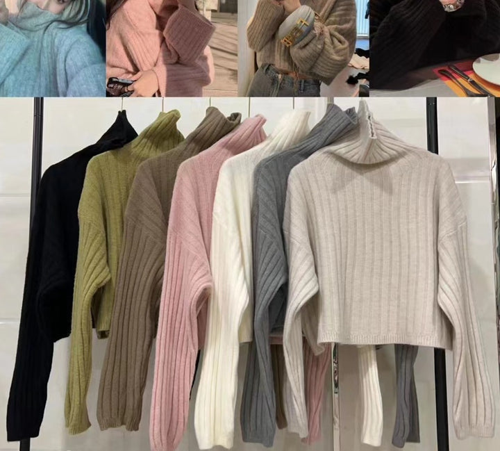 Damers fashionable rullehals sweater med ribstrikket struktur og løs pasform Stilla
