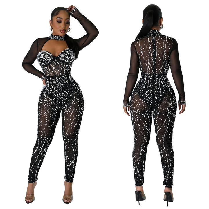 Dame Glamourøs Jumpsuit med gennemsigtigt overmateriale og funklerende strassdekorationer Stilla