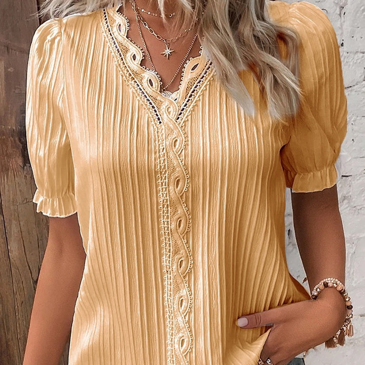 Dame Trendy Bluse med struktur og romantiske spidsdetaljer Stilla