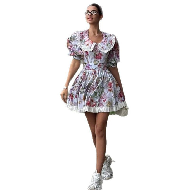 Dame blomsterprintet minikjole med puffærmer og flæsedetaljer Stilla