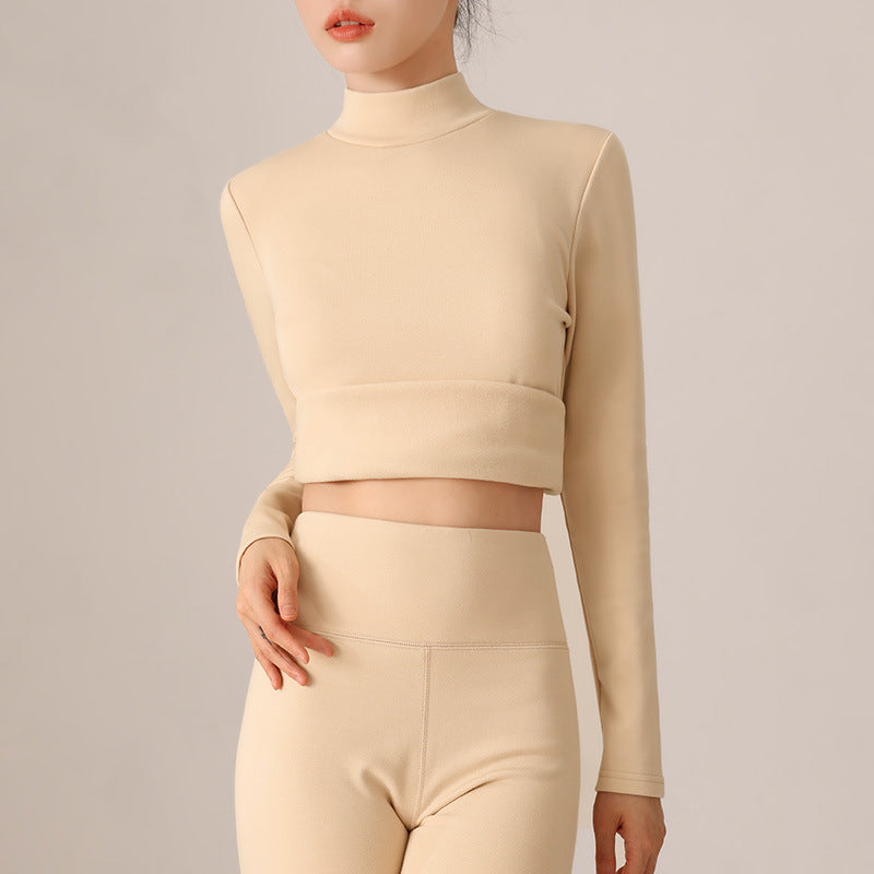 Dame sporttop med stilfuldt rullekrave og trendy cropped længde Stilla