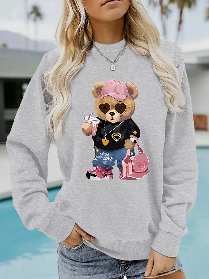 Kvinders sweatshirt med unikt tegneserie-bjørn design og trendy tekst Stilla