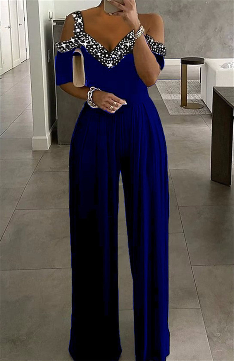 Dame Elegant Jumpsuit med raffinerede Cut-Outærmer og glitrende detaljer Stilla