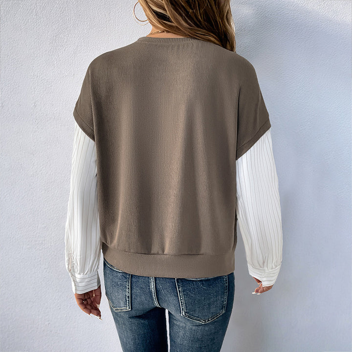 Dames fashionabel top med kreativ lagdelt look og elegante rullede ærmer Stilla