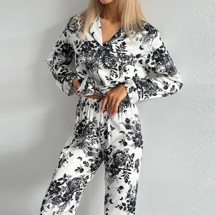 Dame satin pyjamasæt med blomsterdesign og elegante detaljer Stilla
