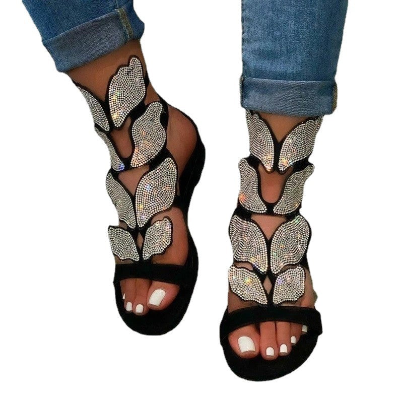 Dame sandaler med funkende sommerfugledesign og komfortabelt fodseng Stilla