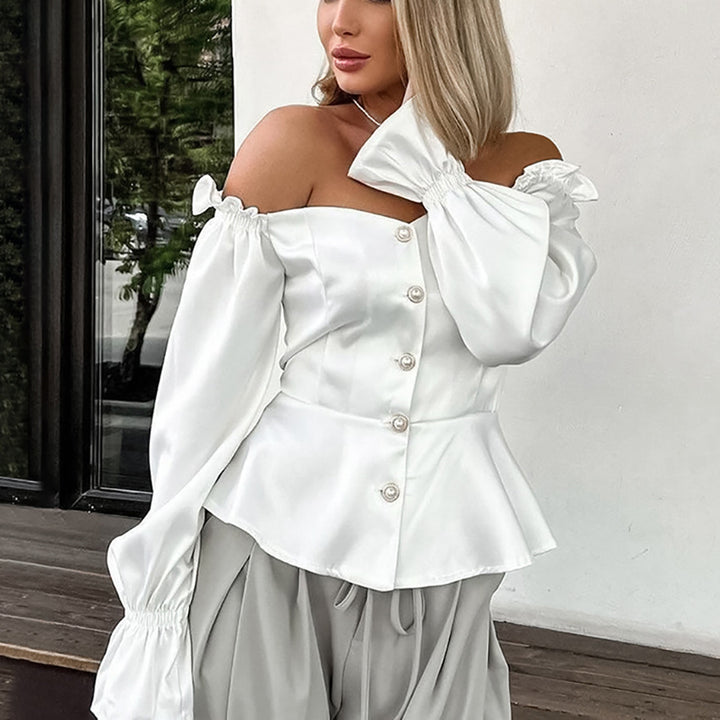 Dame Off-Shoulder Bluse med Puffærmer og elegant Knapliste Stilla