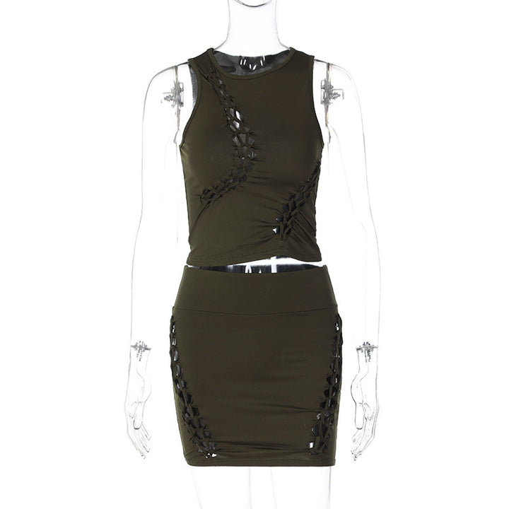 Dame Sæt bestående af sporty top og figursyet miniskørt med trendy cut-out-detaljer Stilla