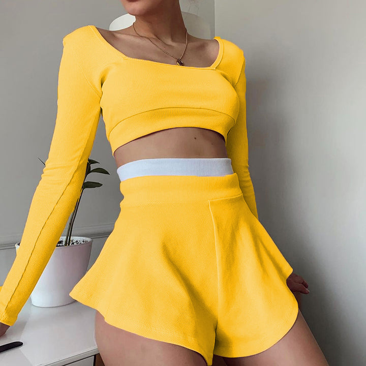 Dame smart Crop-Top med lange ærmer og svingende shorts Stilla