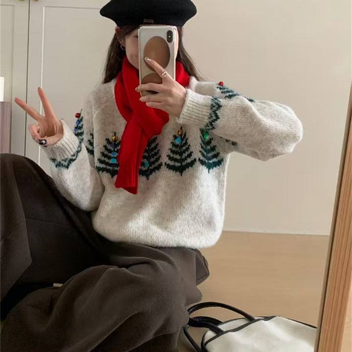 Kvindernes hyggelige sweater med legende mønster og glade applikationer Stilla
