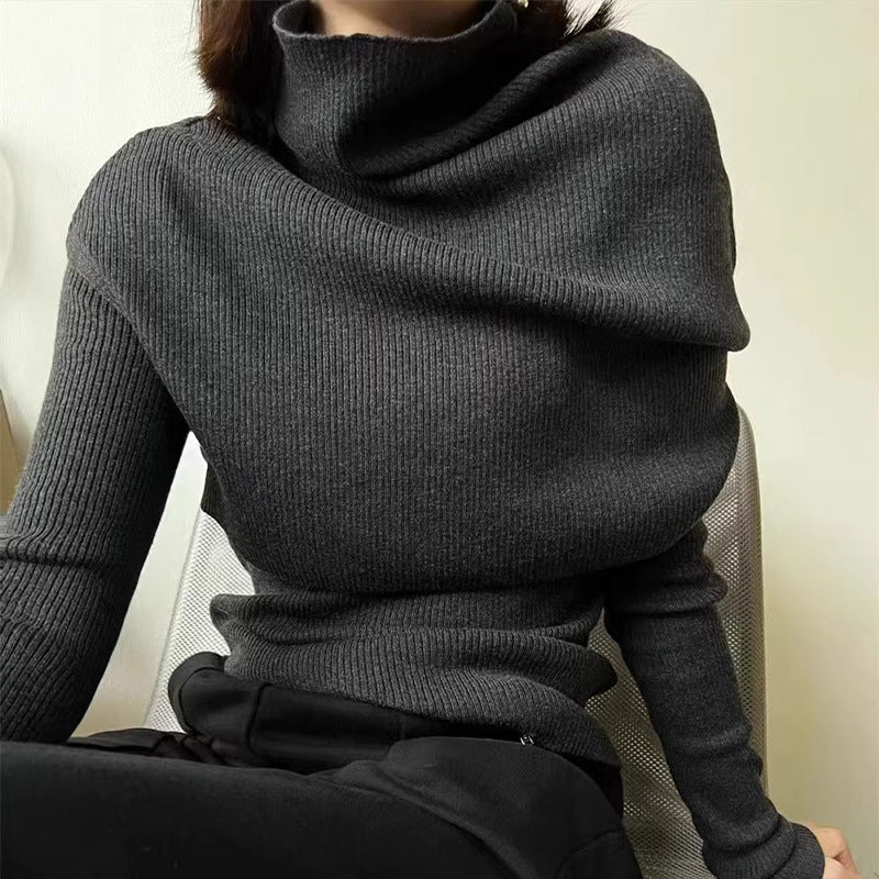 Damer hyggelig turtleneck pullover med elegant asymmetrisk silhuet og fint ribstrik Stilla