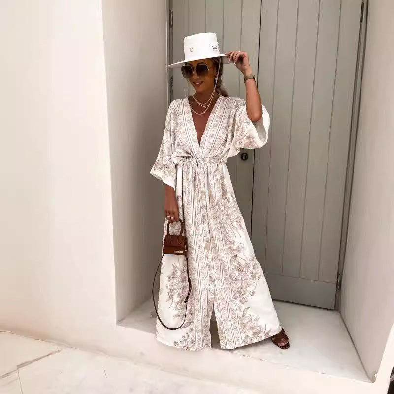Dame let kaftan med kunstnerisk blomsterdesign og elegante detaljer Stilla