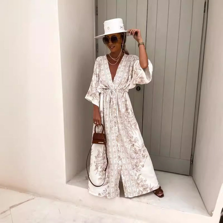Dame let kaftan med kunstnerisk blomsterdesign og elegante detaljer Stilla