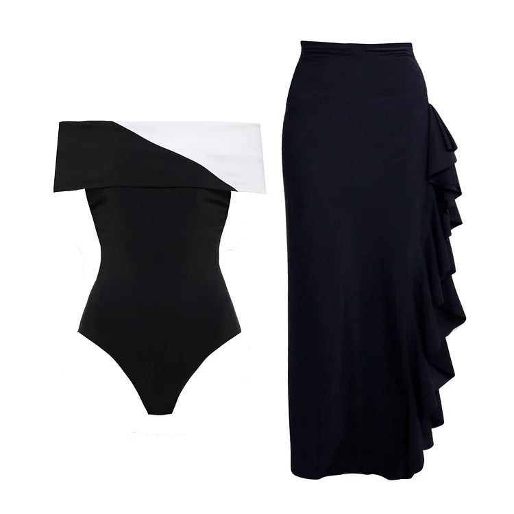 Dame badedragt med moderne off-shoulder design og elegant ruffles maxiskirt Skovae