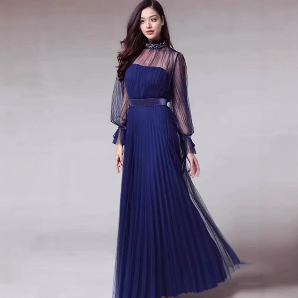 Kvindernes elegante maxi kjole med glitrende chiffon og legende flæse detaljer Skovae