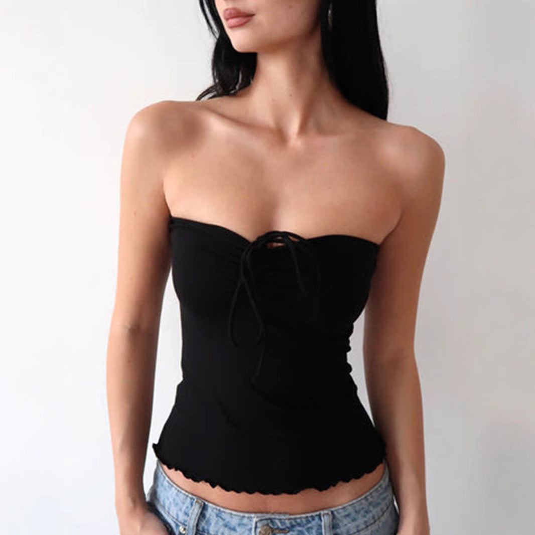 Dame bandeau-top med fine ruffle-detaljer og justerbare stropper Skovae