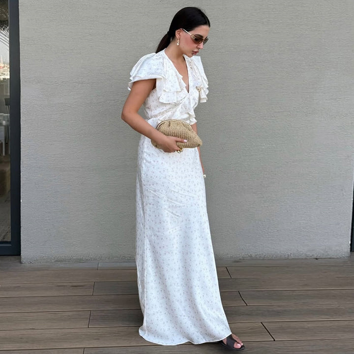 Dame Maxikjole med elegante flæsedetaljer og feminin silhuet Stilla