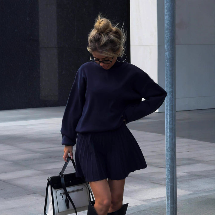 Kvindernes styling sæt med afslappet sweater og plisseret nederdel Stilla